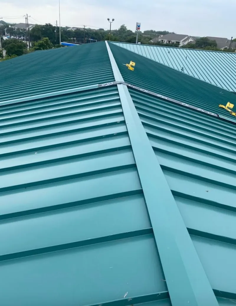 Green commercial metal roof ridge and valley for Metal Roof Repair in Sequim